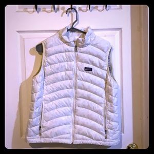 Woman’s large white Patagonia Vest.
